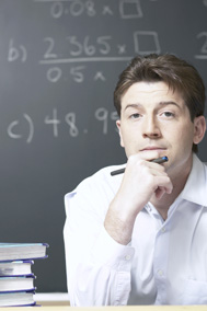 Male teacher sitting